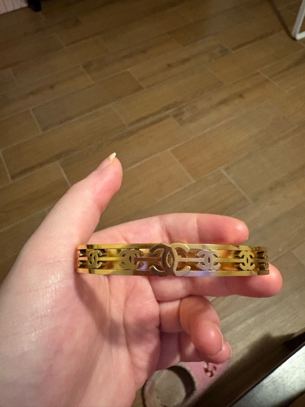 Gold-tone Interlocking Logo Bangle Bracelet